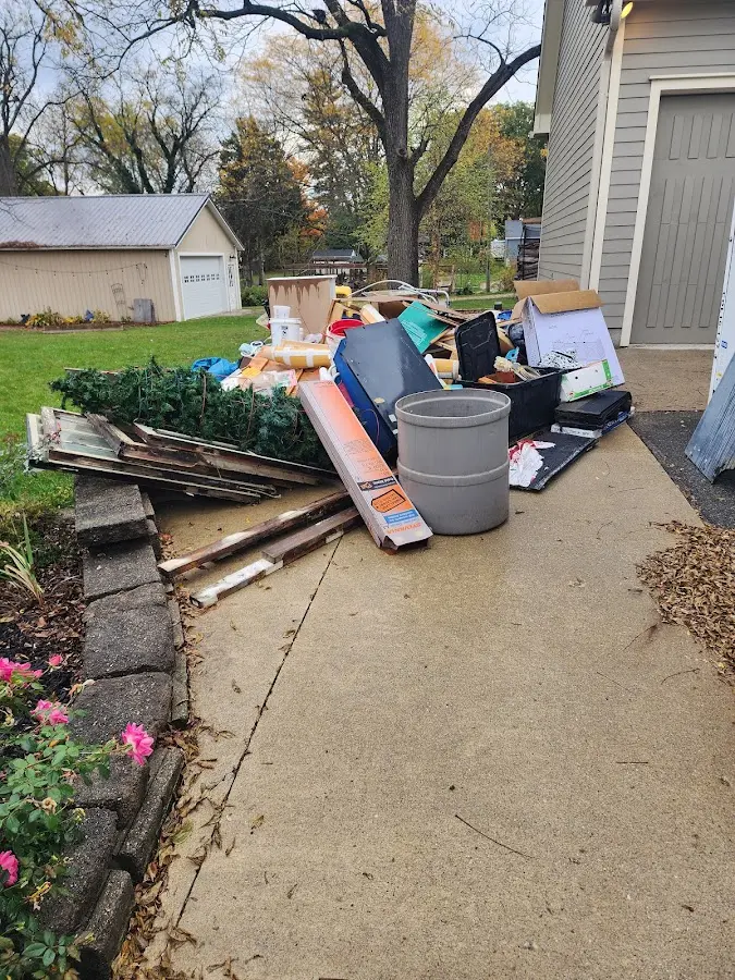 Dumpster being loaded with debris for Commercial Dumpster Rental in Rowland Heights
